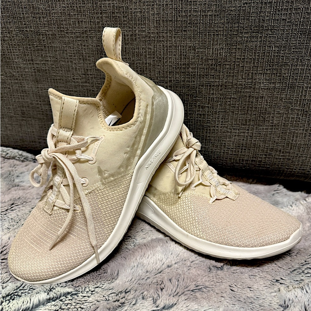 Nike free, size 8. I only wore them a couple of times
